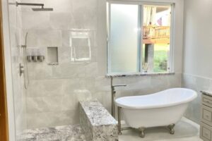 stone shower floor with bench