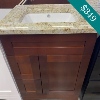 Brown granite and dark wood vanity 24